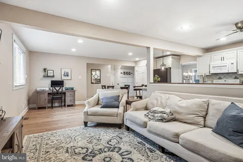 a living room with furniture and a couch