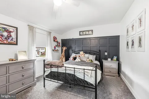 a bedroom with a bed and a closet