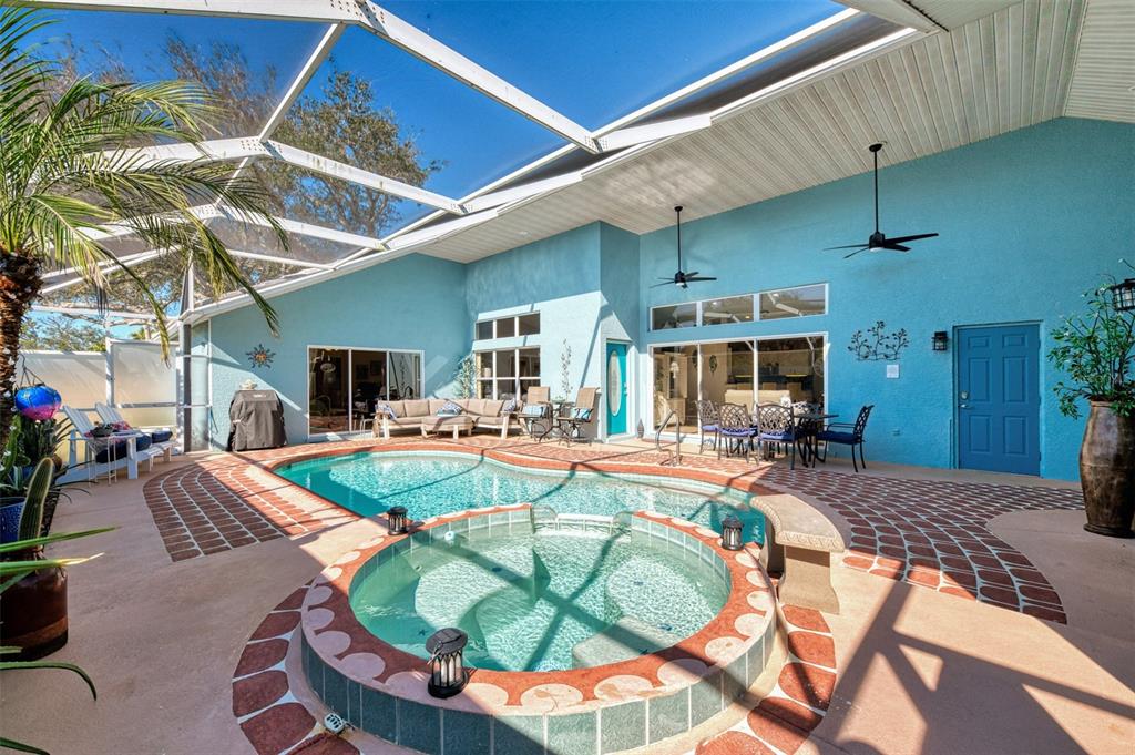 335 St George Court, Unit 1 Venice, FL 34293 - Photo 12 of 87 a swimming pool with outdoor seating