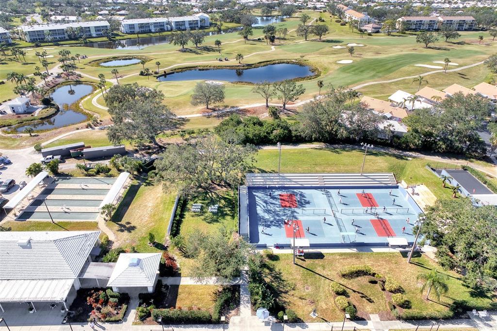 335 St George Court, Unit 1 Venice, FL 34293 - Photo 59 of 87 an aerial view of residential houses with outdoor space and swimming pool