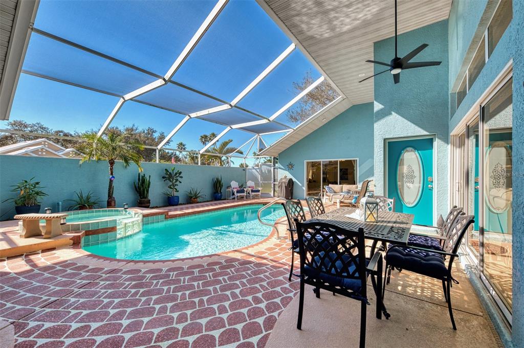335 St George Court, Unit 1 Venice, FL 34293 - Photo 10 of 87 a view of a patio with a table and chairs