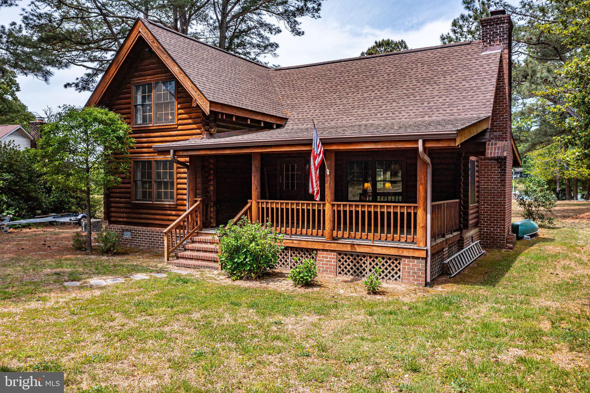 1280 Kelley Neck Road Lancaster, VA 22503 - Photo 2 of 51 front view of a house with a yard