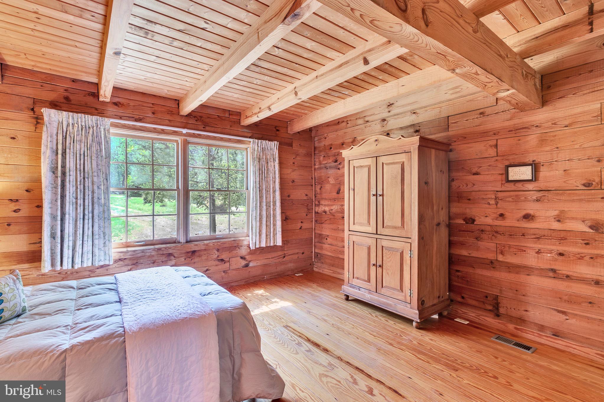 1280 Kelley Neck Road Lancaster, VA 22503 - Photo 26 of 51 a bed room with a bed and a window