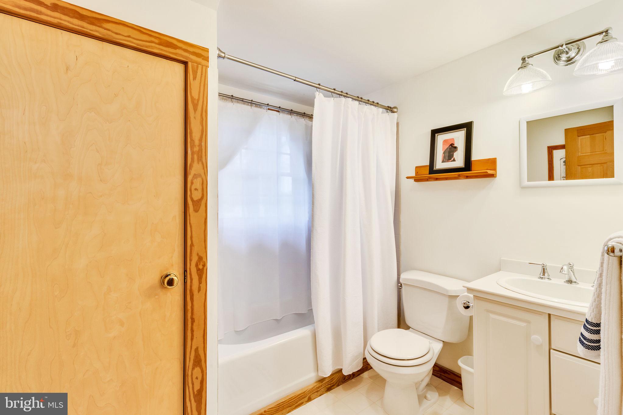 1280 Kelley Neck Road Lancaster, VA 22503 - Photo 29 of 51 a bathroom with a sink and a toilet