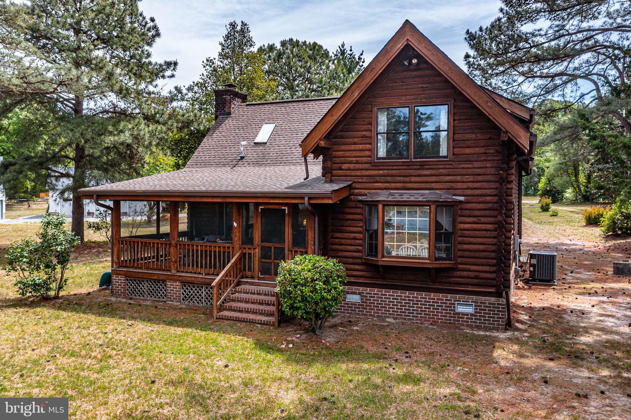 1280 Kelley Neck Road Lancaster, VA 22503 - Photo 41 of 51 a front view of a house with a yard
