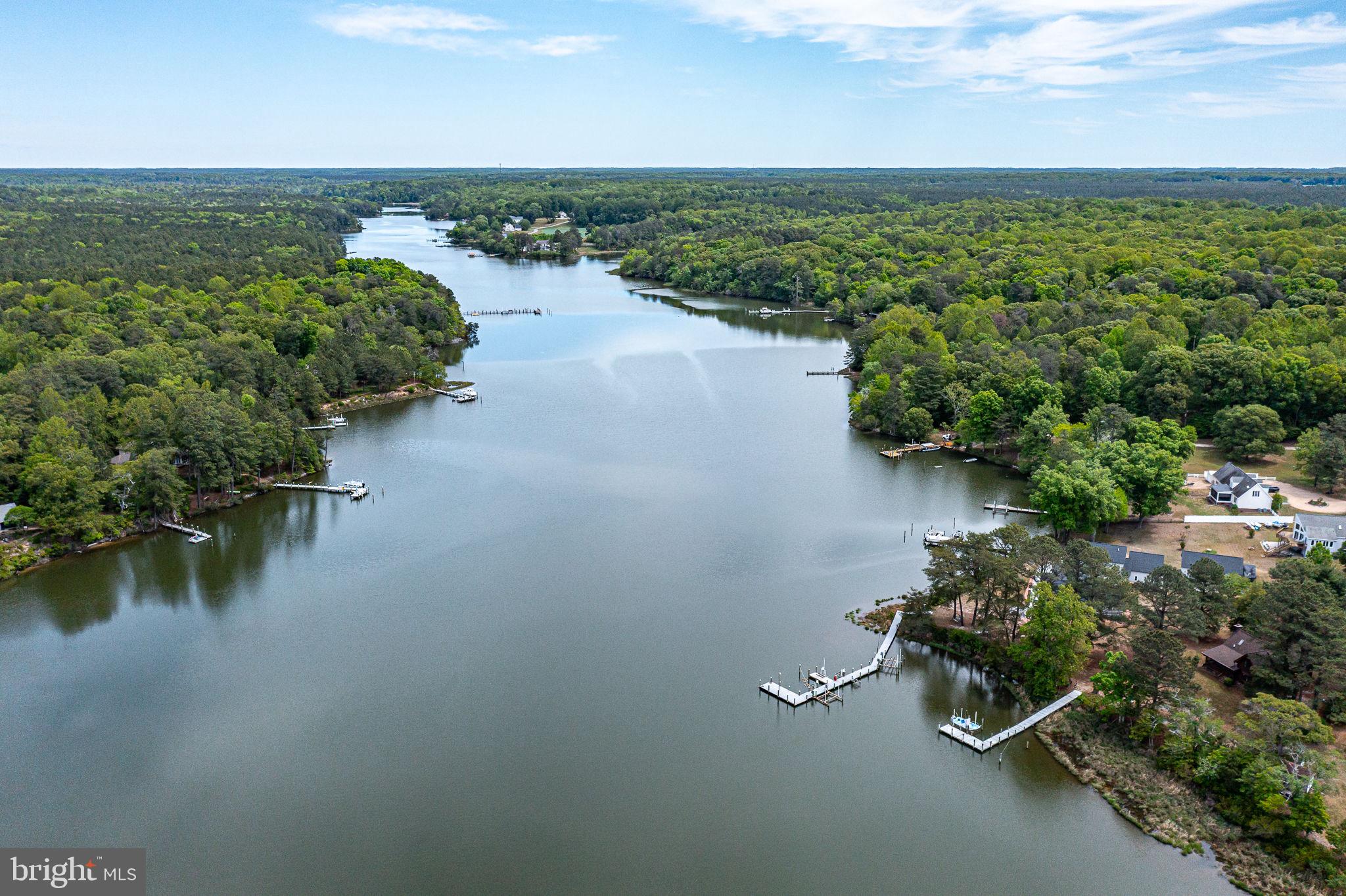 1280 Kelley Neck Road Lancaster, VA 22503 - Photo 8 of 51 a view of a lake with outdoor space