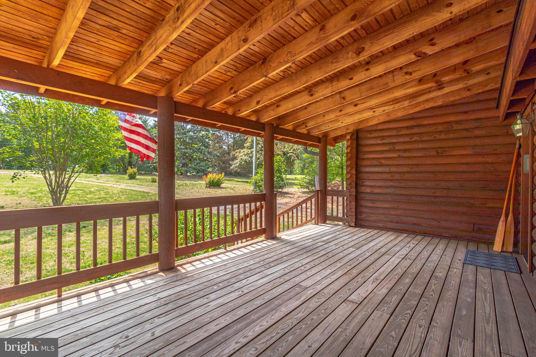 1280 Kelley Neck Road Lancaster, VA 22503 - Photo 10 of 51 a view of porch with wooden floor