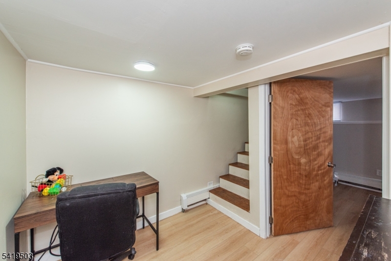 40 Kingsland Road West Milford, NJ 07421 - Photo 15 of 20 a view of entryway with stairs and wooden floor