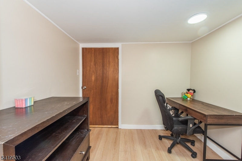 40 Kingsland Road West Milford, NJ 07421 - Photo 16 of 20 a workspace with furniture and wooden floor