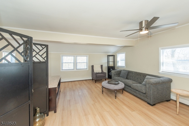 40 Kingsland Road West Milford, NJ 07421 - Photo 3 of 20 a living room with furniture and a wooden floor