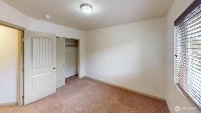 an empty room with closet