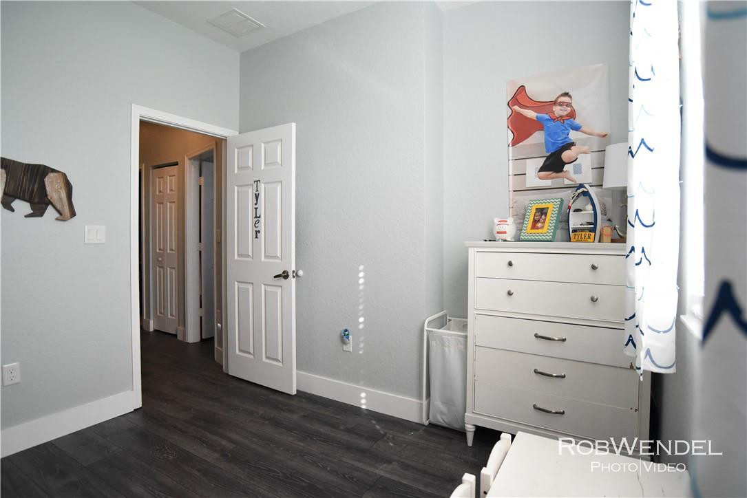 2851 Prospect Road, Unit 405 Tamarac, FL 33309 - Photo 16 of 25 a room with a closet and a mirror