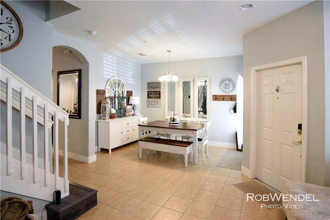 2851 Prospect Road, Unit 405 Tamarac, FL 33309 - Photo 2 of 25 a bedroom with furniture and a window