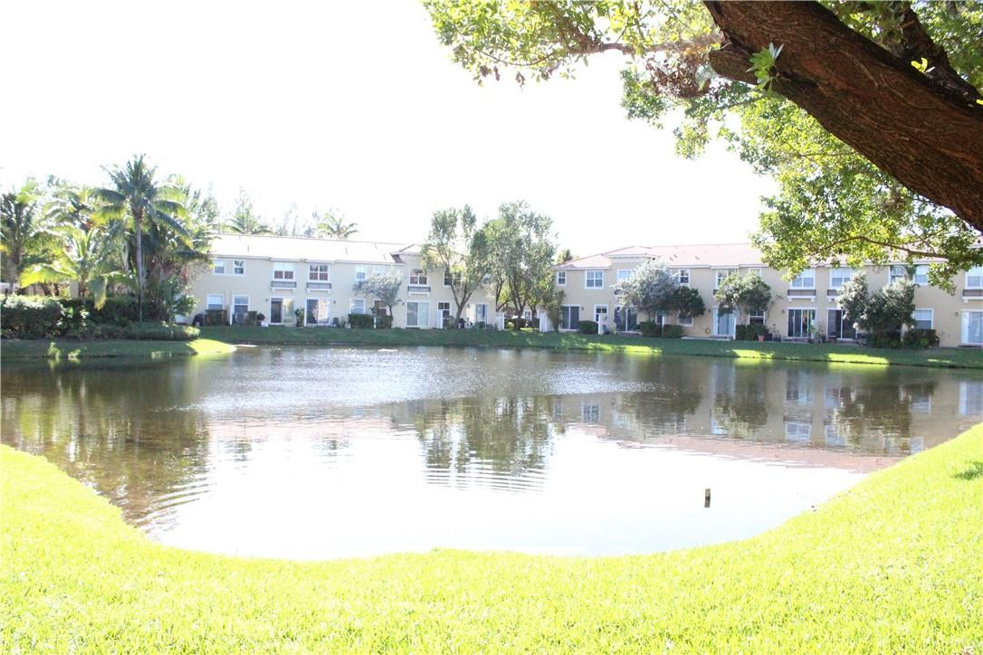 2851 Prospect Road, Unit 405 Tamarac, FL 33309 - Photo 25 of 25 a view of a lake with houses