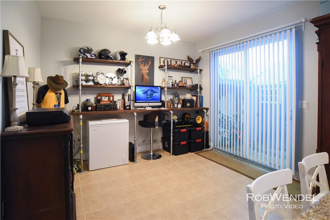 2851 Prospect Road, Unit 405 Tamarac, FL 33309 - Photo 8 of 25 a bed room with a bed and a television