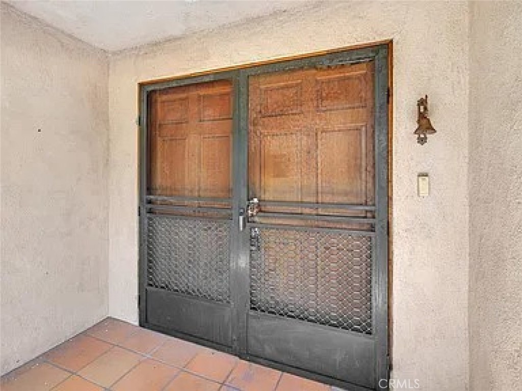 10528 1/2 Hillhaven Avenue Tujunga, CA 91042 - Photo 3 of 28 a bathroom with a glass door shower
