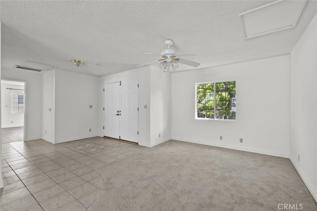10528 1/2 Hillhaven Avenue Tujunga, CA 91042 - Photo 7 of 28 a view of an empty room with a window