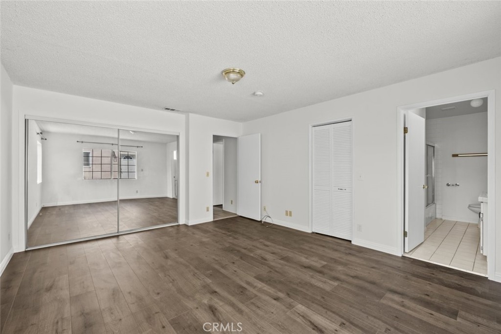 10528 1/2 Hillhaven Avenue Tujunga, CA 91042 - Photo 9 of 28 an empty room with a empty space and windows