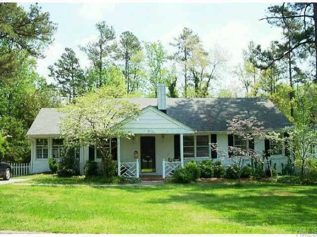 1632 Lorraine Road Raleigh, NC 27607 - Photo 1 of 1 a front view of a house with a garden