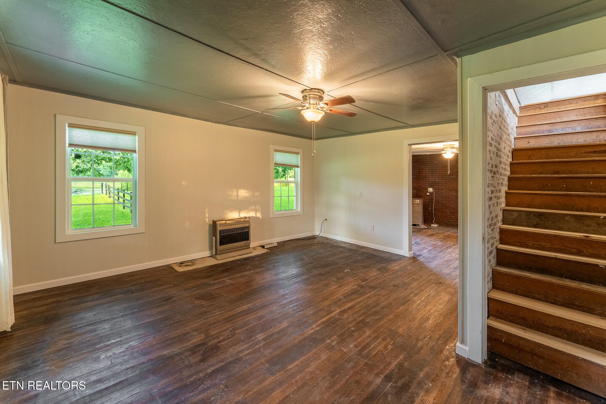 2530 Roslin Road Deer Lodge, TN 37726 - Photo 18 of 58 a view of empty room with wooden floor and fan