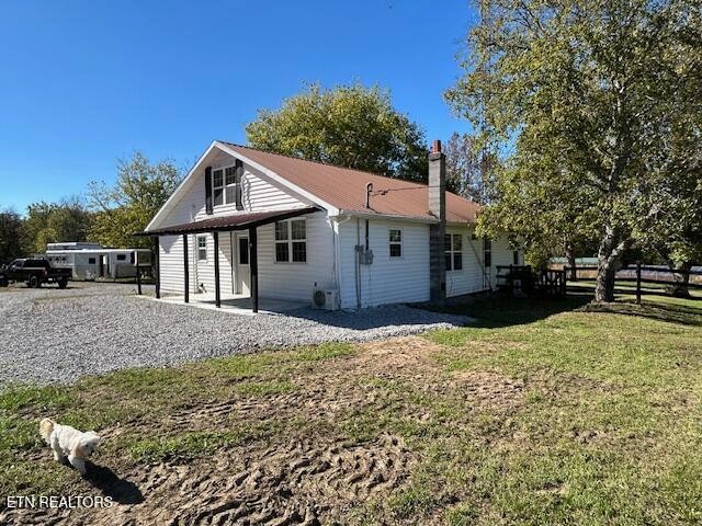 2530 Roslin Road Deer Lodge, TN 37726 - Photo 3 of 58 a view of a house with a yard