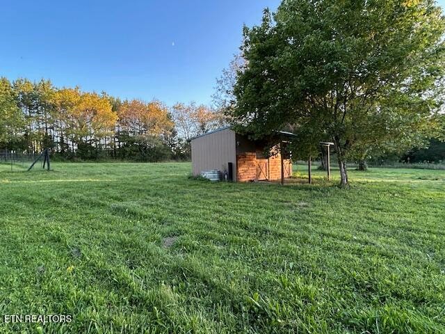 2530 Roslin Road Deer Lodge, TN 37726 - Photo 46 of 58 a green field with lots of bushes