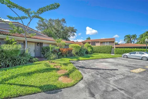a house view with a garden space