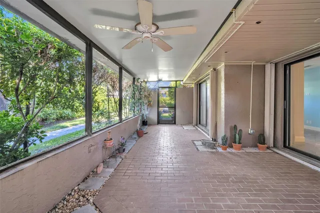 a view of swimming pool with chairs