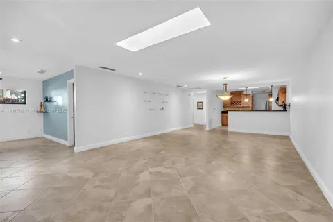 a view of a kitchen with a sink