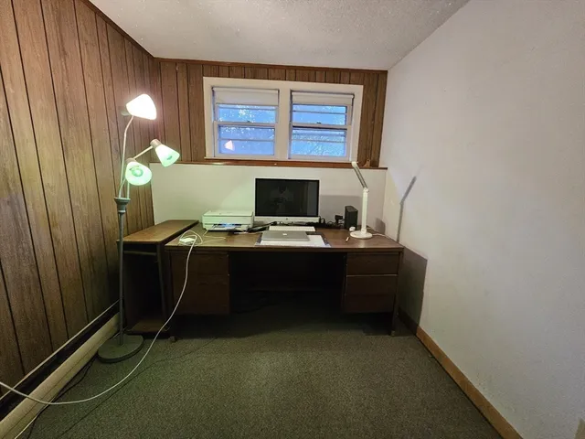 a room with furniture and a window