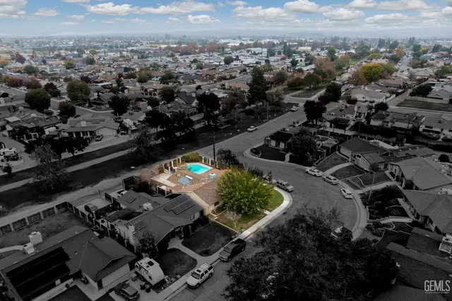 an aerial view of a building with outdoor space
