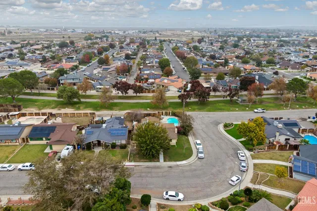 an aerial view of residential building and lake view