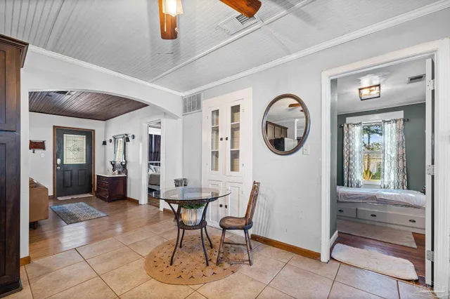 a kitchen with stainless steel appliances granite countertop a stove refrigerator and cabinets