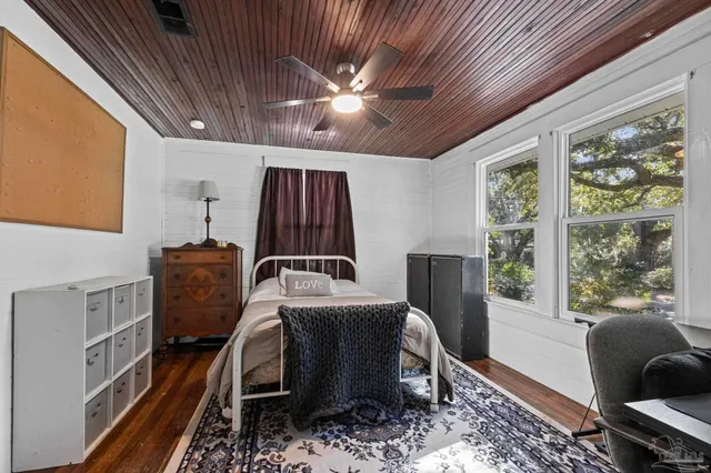 a house with swimming pool in front of it