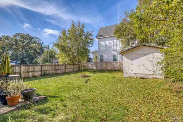 a view of a yard in front of a house