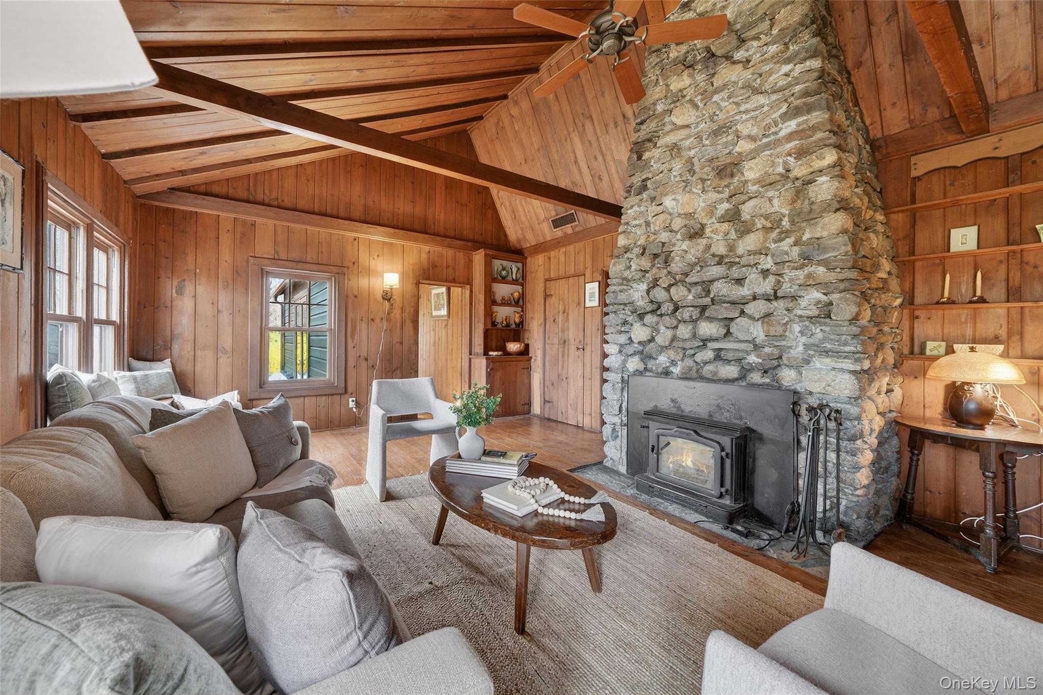 270 Colonel Greene Road Yorktown Heights, NY 10598 - Photo 15 of 26 a living room with furniture and a fireplace