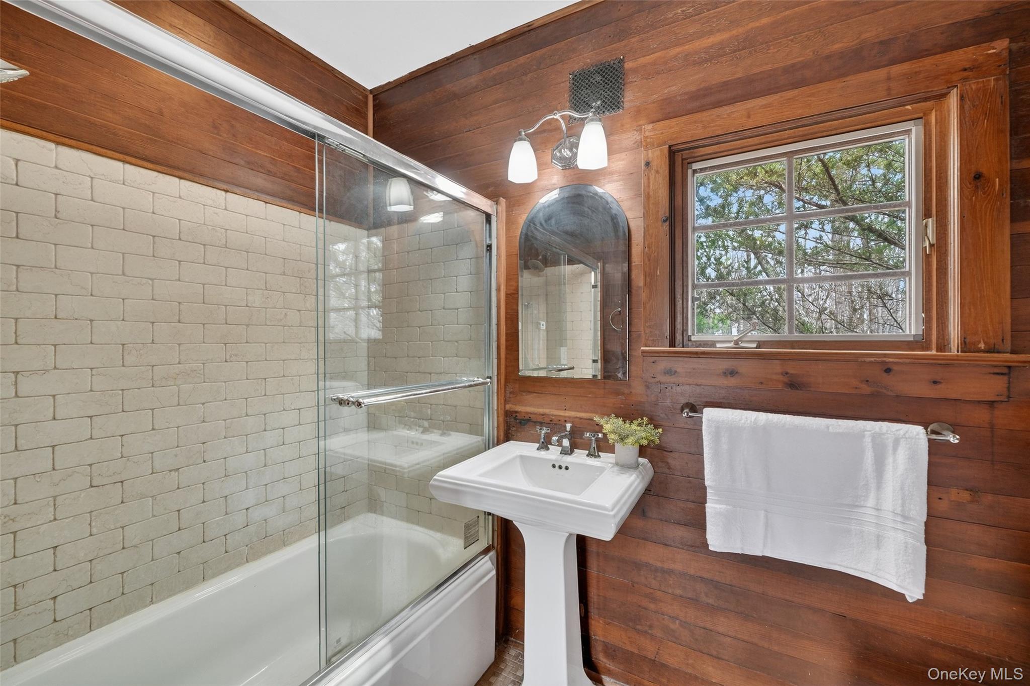 270 Colonel Greene Road Yorktown Heights, NY 10598 - Photo 23 of 26 a bathroom with a sink bathtub and a shower