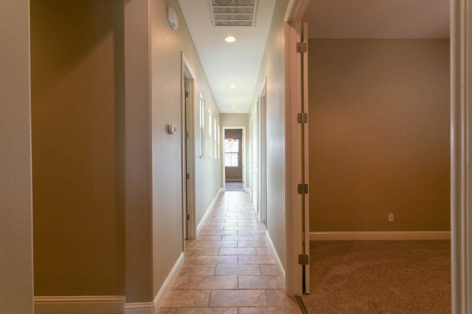 3271 Graybark Avenue Clovis, CA 93619 - Photo 9 of 26 a view of a hallway