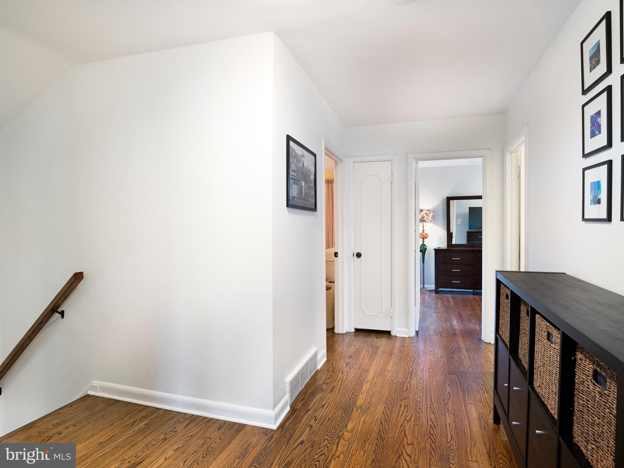 123 Old Forest Road Wynnewood, PA 19096 - Photo 20 of 29 a view of a hallway with wooden floor and closet