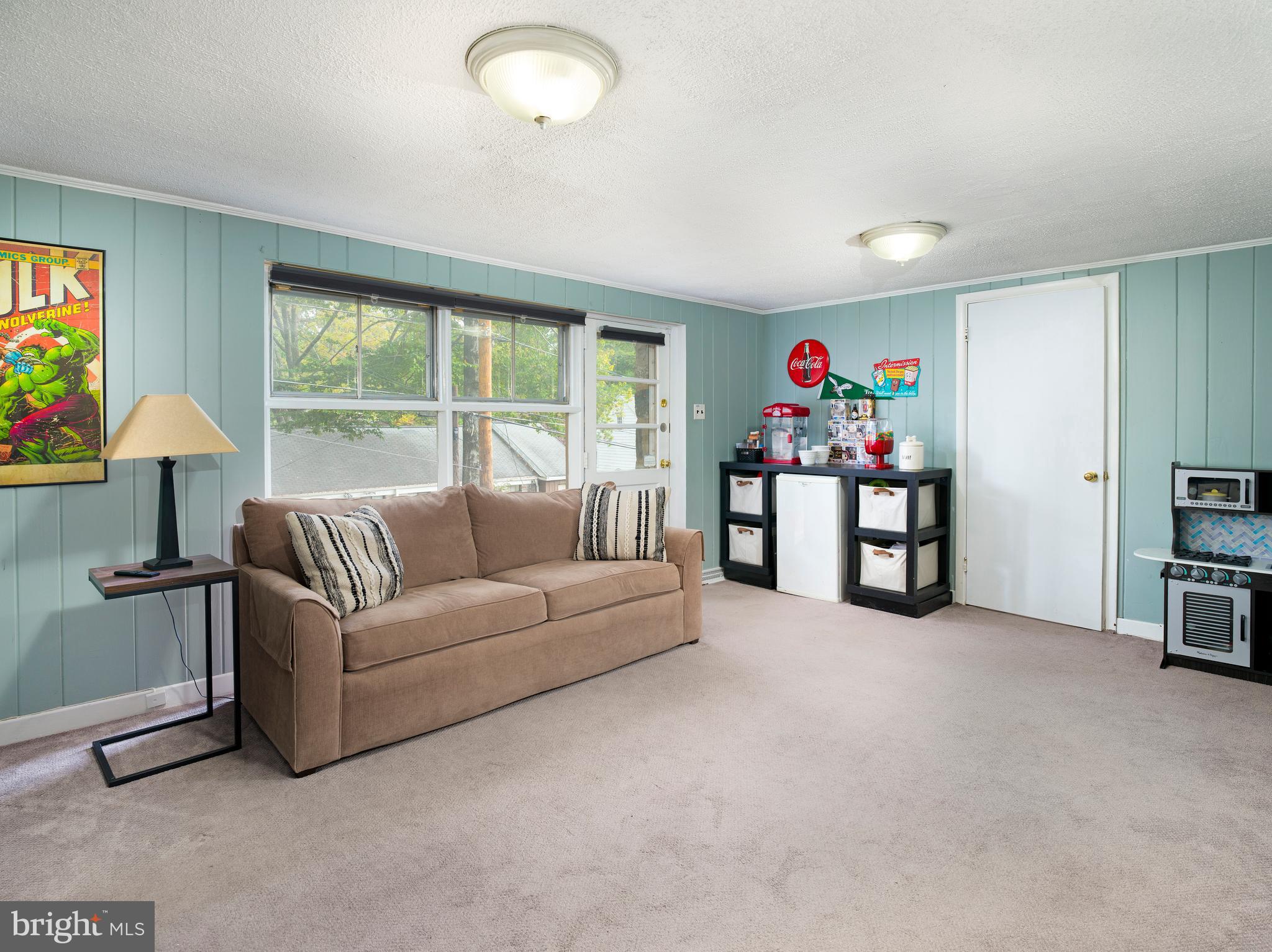 123 Old Forest Road Wynnewood, PA 19096 - Photo 21 of 29 a living room with furniture and a window