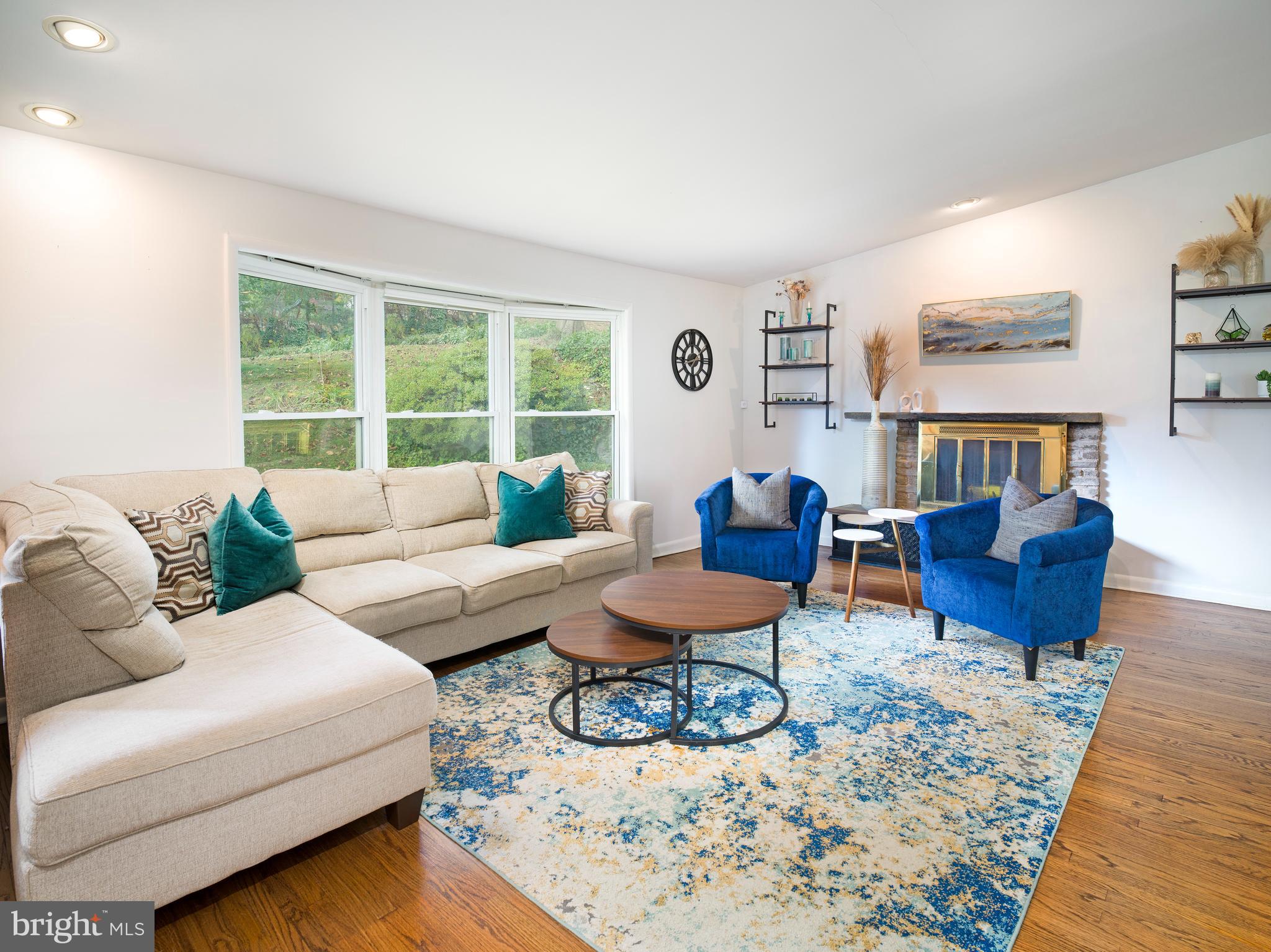 123 Old Forest Road Wynnewood, PA 19096 - Photo 4 of 29 a living room with furniture a rug and a window