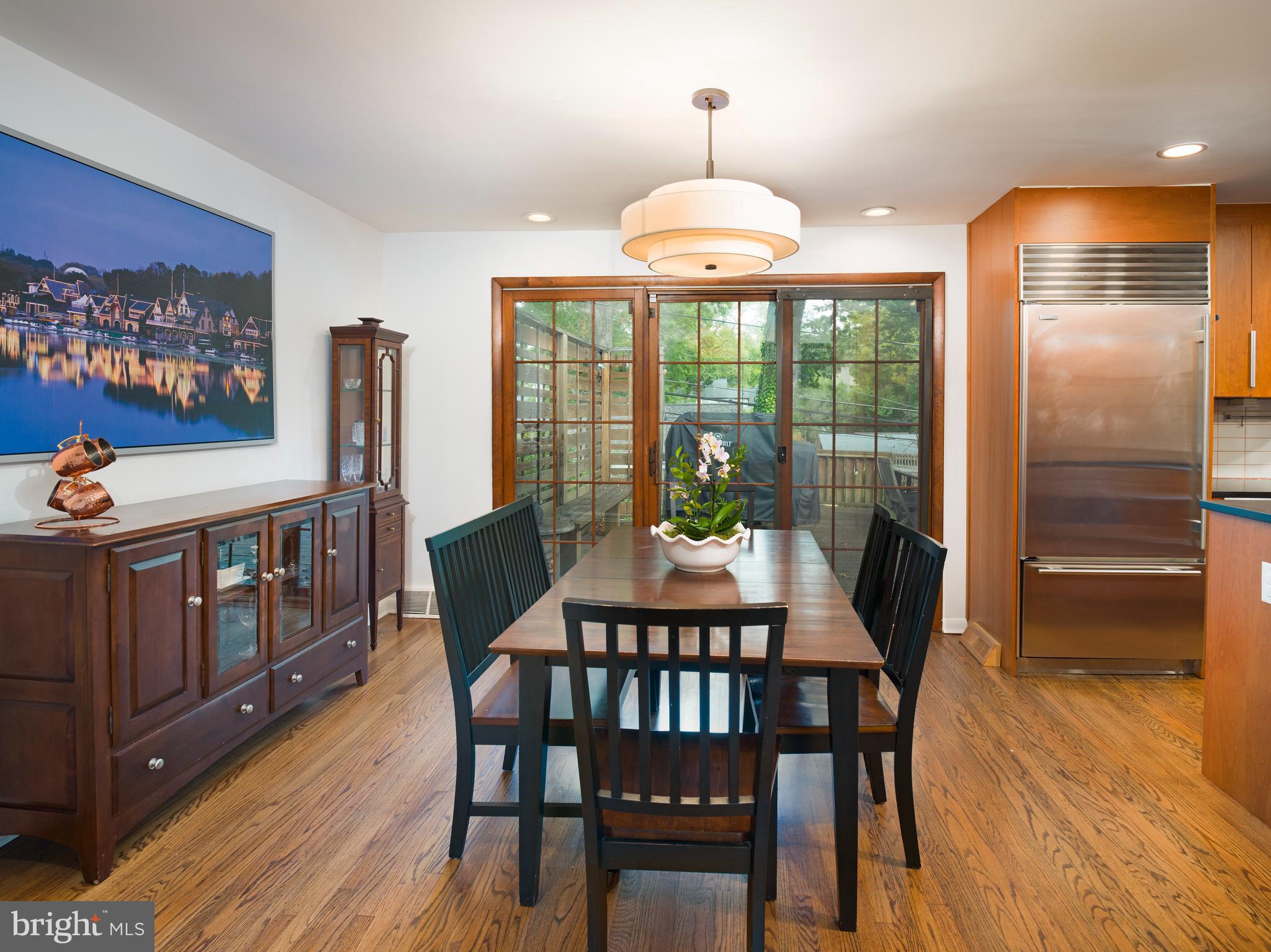 123 Old Forest Road Wynnewood, PA 19096 - Photo 7 of 29 a view of a dining room with furniture window and wooden floor