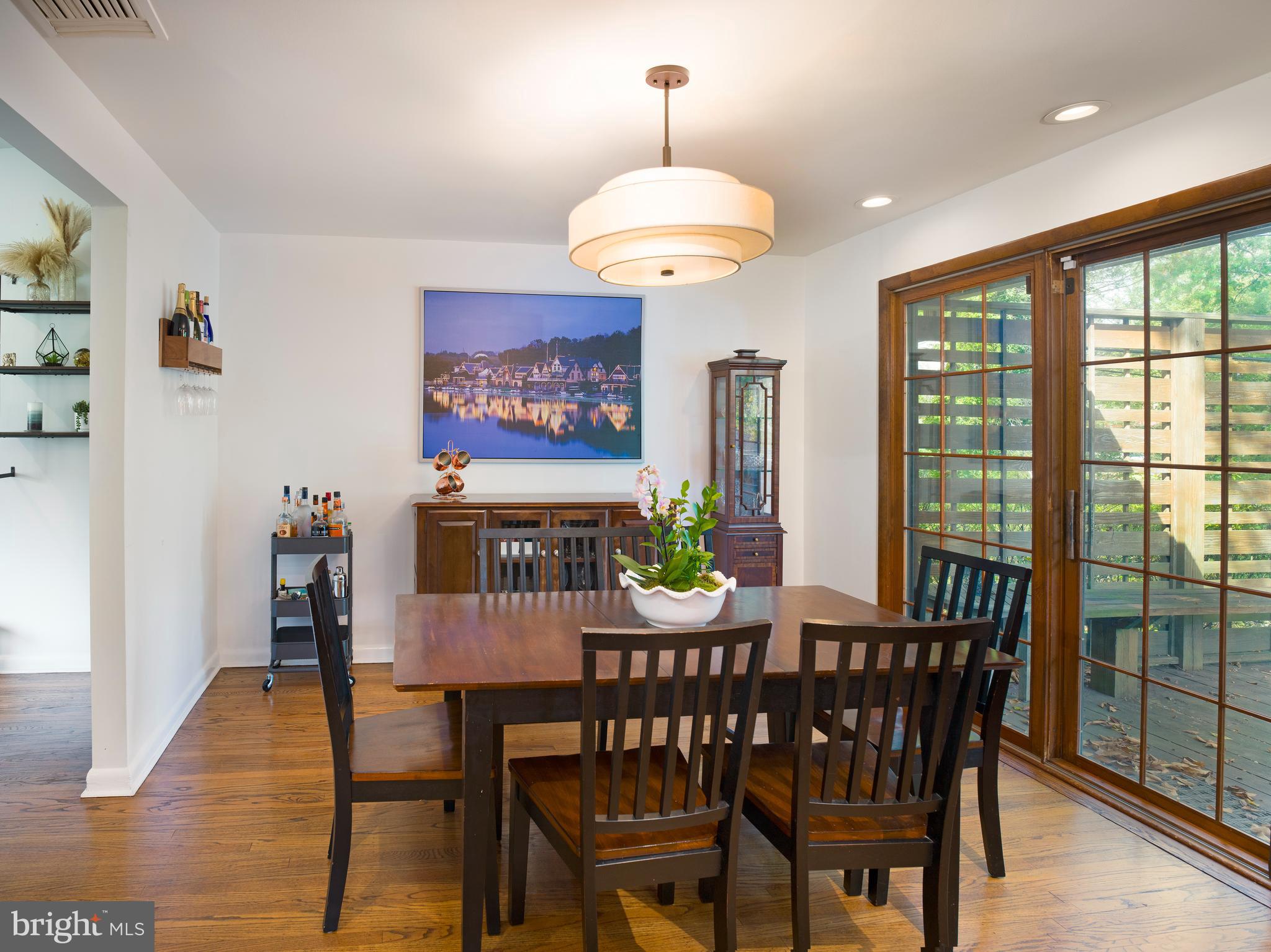 123 Old Forest Road Wynnewood, PA 19096 - Photo 8 of 29 a view of a dining room with furniture window and wooden floor