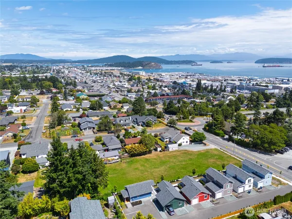 an aerial view of a houses and an outdoor space