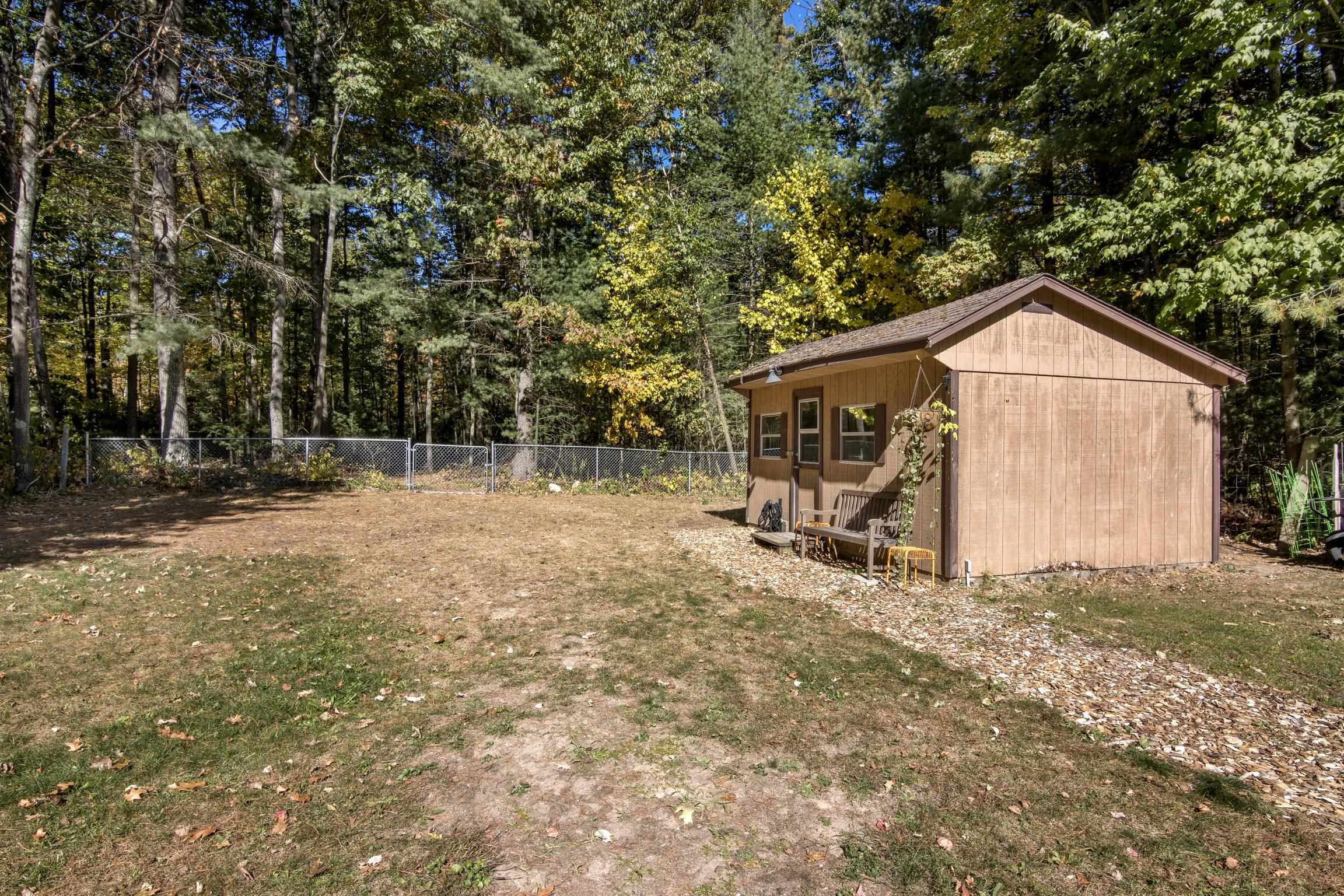10634 Wildwood Road, Unit LOT: 31 Interlochen, MI 49643 - Photo 23 of 25