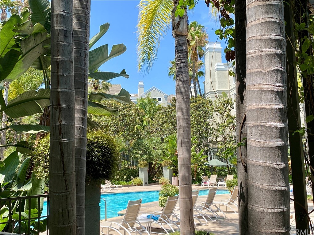 2233 Martin, Unit 108 Irvine, CA 92612 - Photo 28 of 30 Pool and Spa surrounded by Tropical foltiage