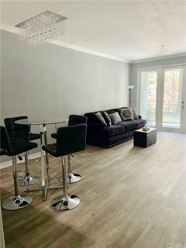 2233 Martin, Unit 108 Irvine, CA 92612 - Photo 4 of 30 Living Room has direct access to covers balcony