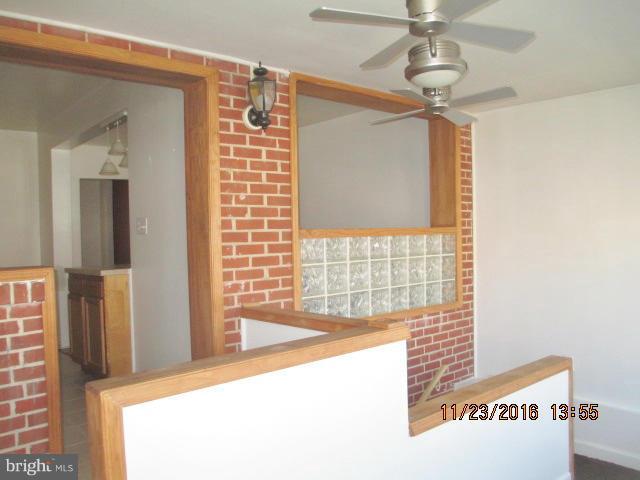 2227 Coralthorn Road Baltimore, MD 21220 - Photo 8 of 15 Enclosed rear porch