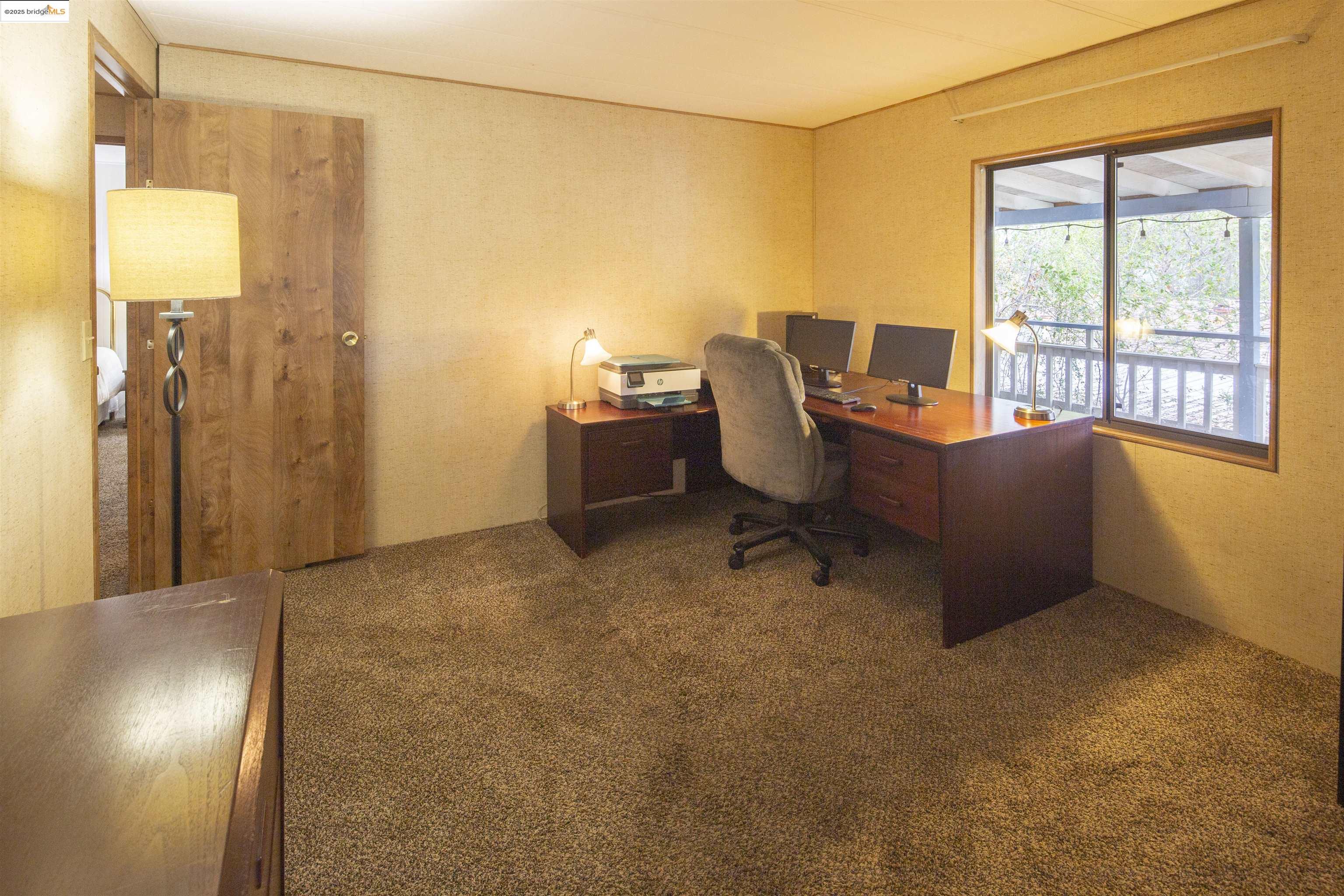 18717 Mill Villa Road, Unit 156 Jamestown, CA 95327 - Photo 23 of 40 Home office with carpet