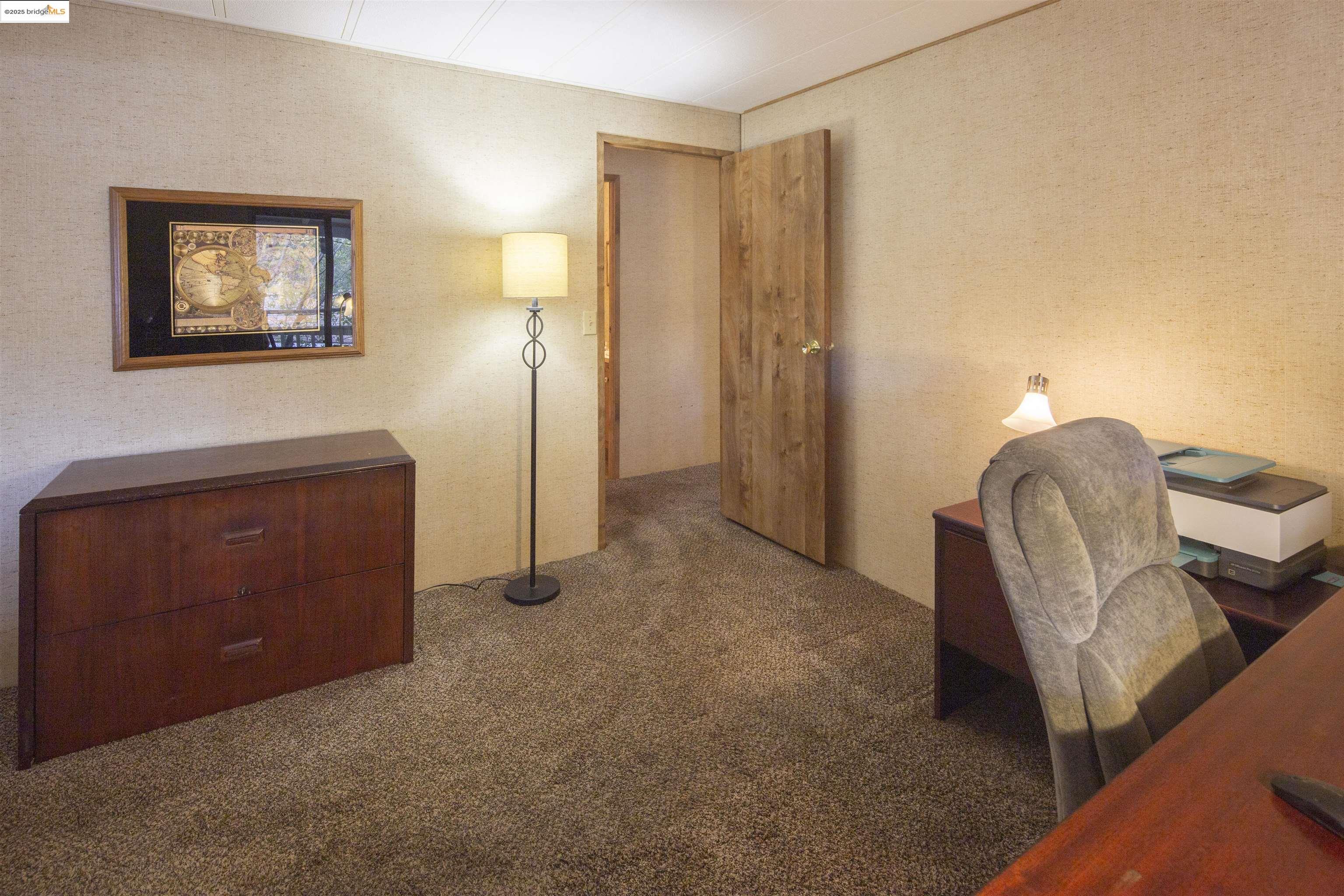 18717 Mill Villa Road, Unit 156 Jamestown, CA 95327 - Photo 24 of 40 Office area featuring dark colored carpet